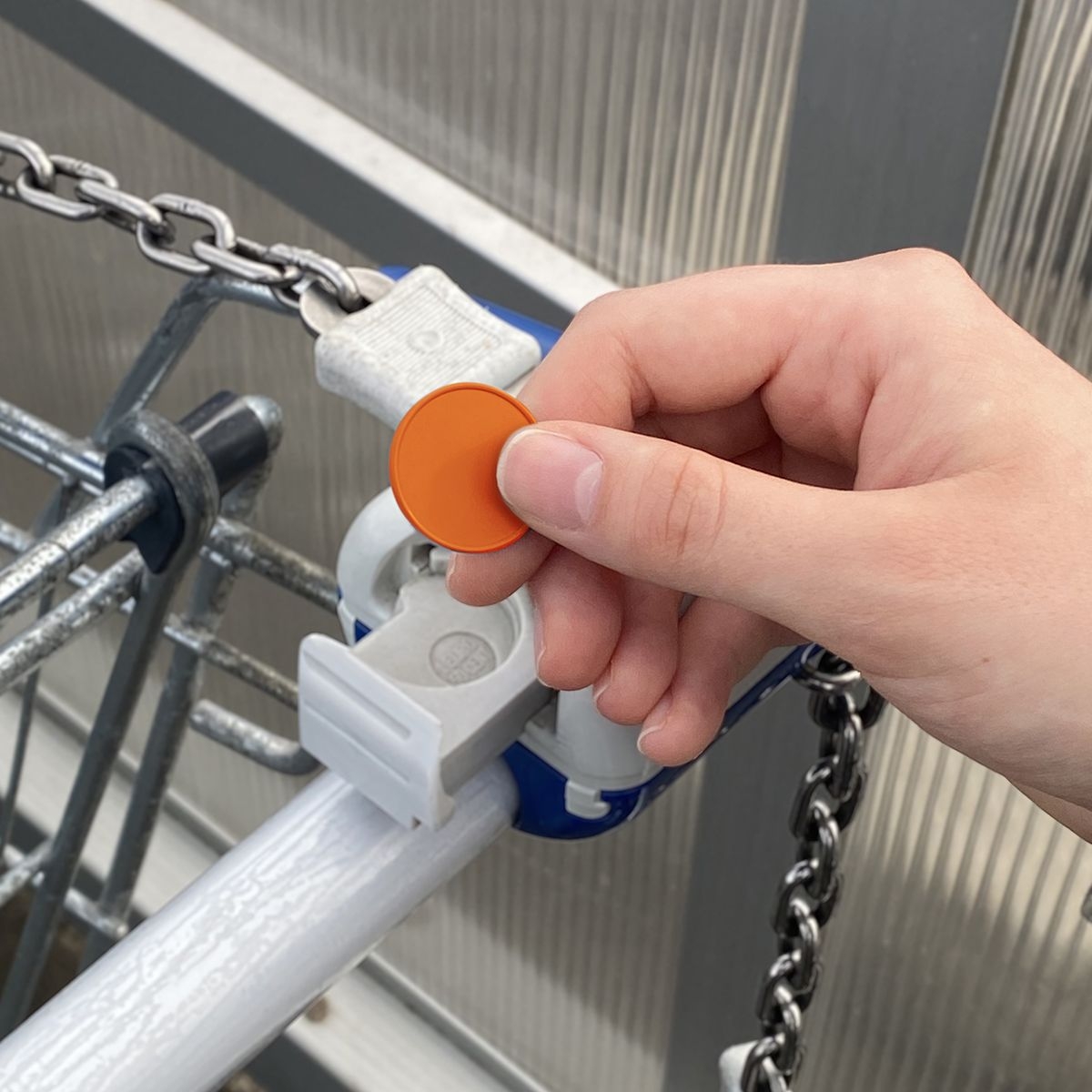 HE7516K-5-5Chiphalter mit 1€-Chip _Haus_ orange_ orange