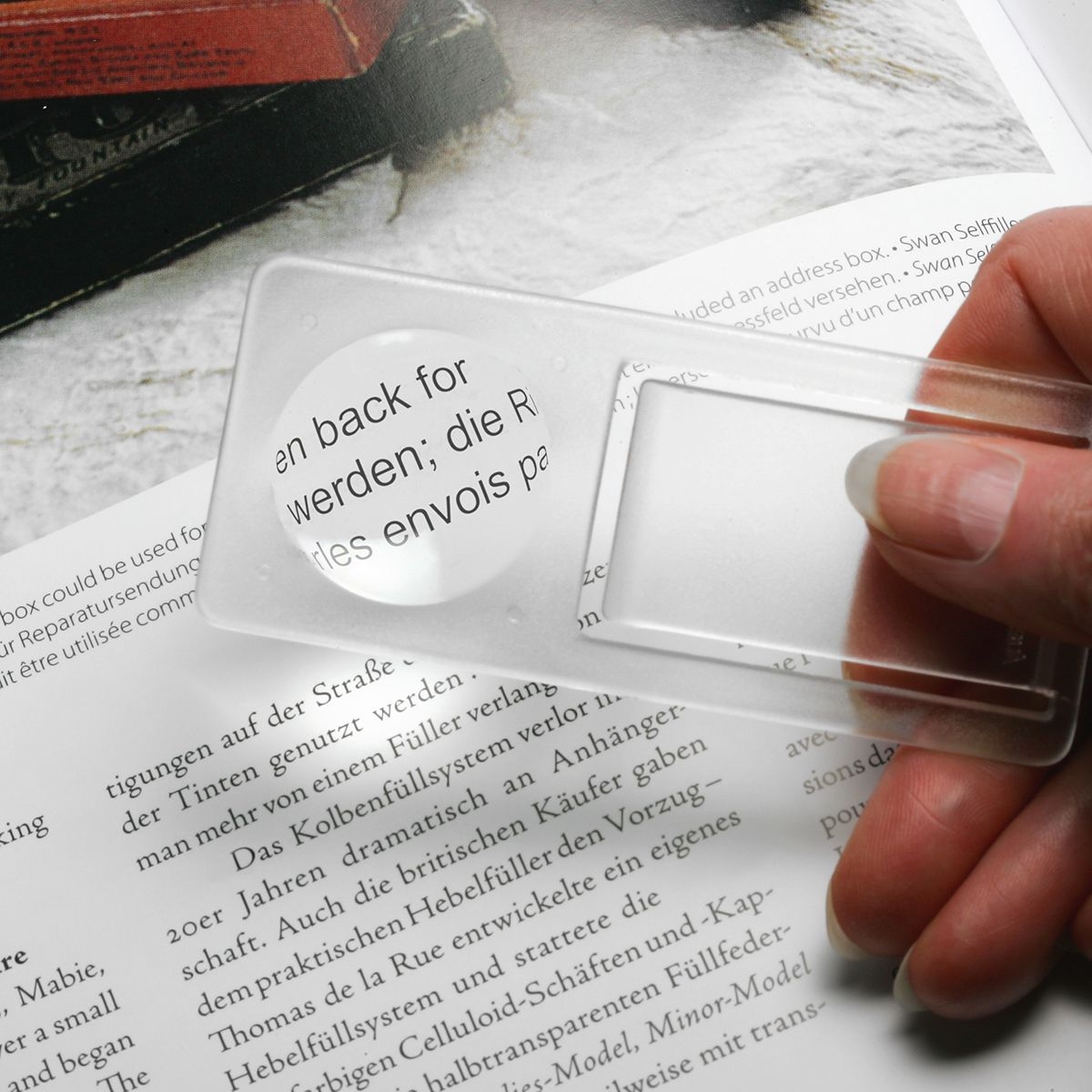 HE8640-F7Zettelklammer mit Lupe_ gefrostet glasklar